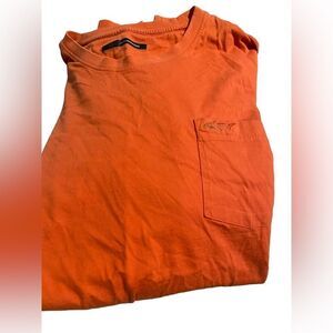 Greg Norman size extra large orange t shirt with pocket excellent condition